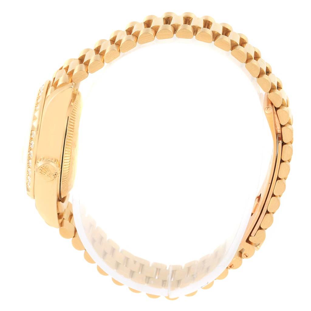 The image shows a side view of a Rolex President 79268 Women
s Yellow Gold Champagne Dial 79268 Women
s Yellow Gold Champagne Dial model watch, highlighting the link bracelet and the watch case with a side crown.