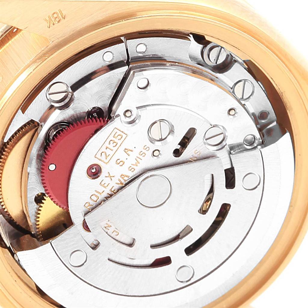 This image shows an open caseback view of the Rolex President 69158 Women
s Yellow Gold Champagne Dial 69158 Women
s Yellow Gold Champagne Dial model, revealing its intricate movement and inner components.