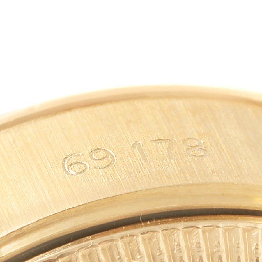 This close-up image shows the side of the bezel, including reference number 69178, of a Rolex President 69178 Women's Yellow Gold Blue Dial 69178 Women's Yellow Gold Blue Dial model watch.