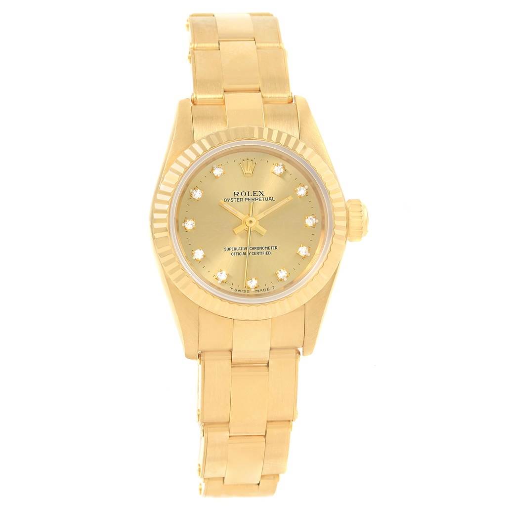 The image shows a front view of a Rolex President 67198 Women
s Yellow Gold Champagne Dial 67198 Women
s Yellow Gold Champagne Dial model watch with its gold bracelet, dial, and crown clearly visible.