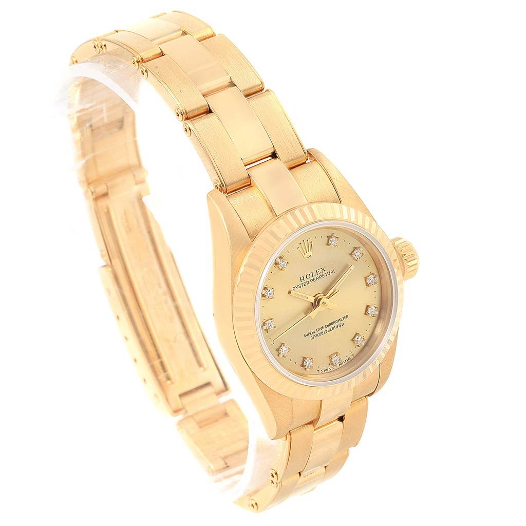 This image shows a Rolex President 67198 Women
s Yellow Gold Champagne Dial 67198 Women
s Yellow Gold Champagne Dial model watch at a three-quarter angle, highlighting its face, band, and partially open clasp.