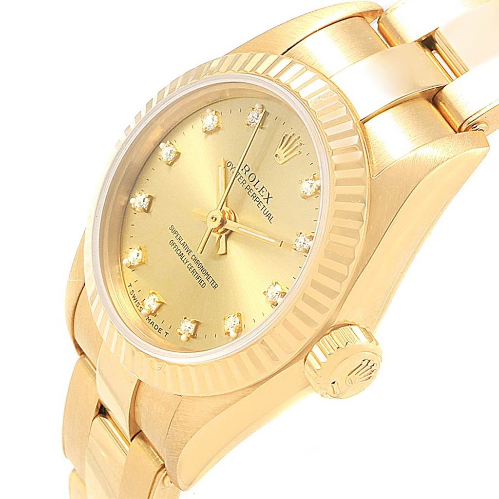 The image shows a close-up of the Rolex President 67198 Women
s Yellow Gold Champagne Dial 67198 Women
s Yellow Gold Champagne Dial model watch, focusing on the face, bezel, crown, and part of the bracelet.