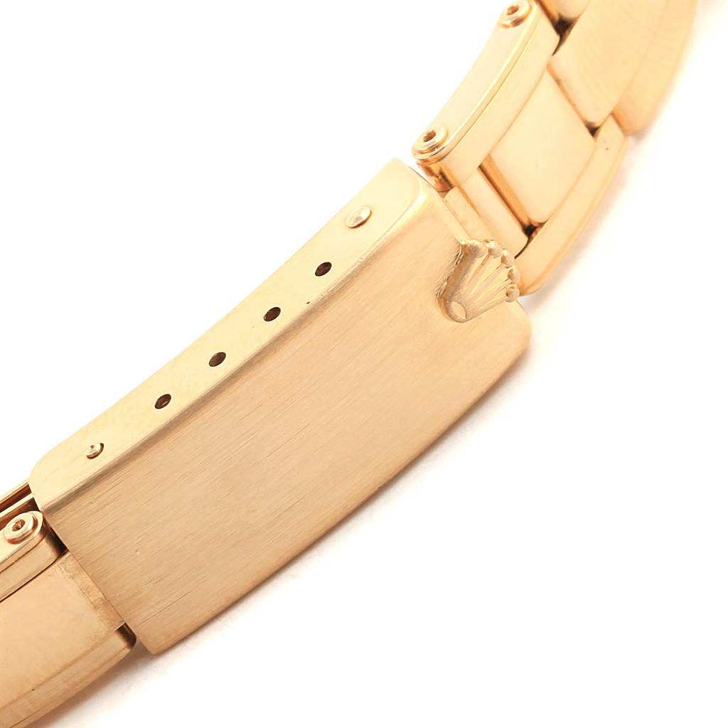 This image shows the clasp and part of the bracelet of a Rolex President 67198 Women
s Yellow Gold Champagne Dial 67198 Women
s Yellow Gold Champagne Dial model watch.