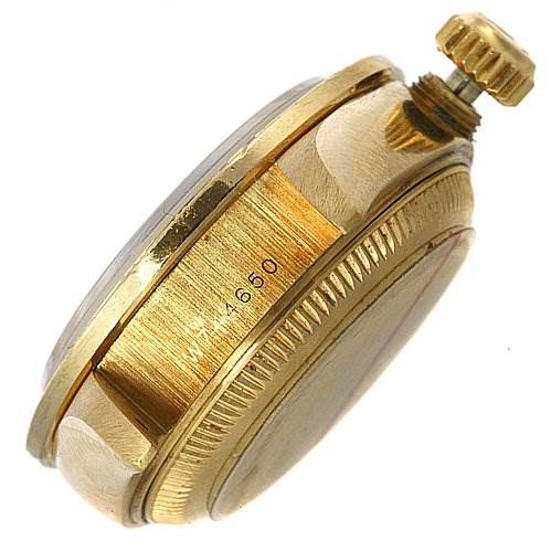 This image shows a side view of the Rolex President 69068 Women
s Yellow Gold Mother of Pearl Dial 69068 Women
s Yellow Gold Mother of Pearl Dial watch case and crown.