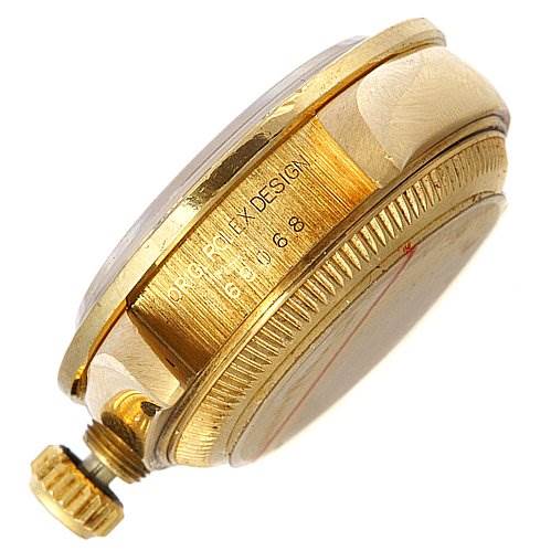The image shows a side view of the case and crown of a Rolex President 69068 Women
s Yellow Gold Mother of Pearl Dial 69068 Women
s Yellow Gold Mother of Pearl Dial model watch.