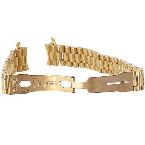 The image shows a gold bracelet of the Rolex President 69068 Women
s Yellow Gold Mother of Pearl Dial 69068 Women
s Yellow Gold Mother of Pearl Dial model from a top angle, displaying the clasp and links.