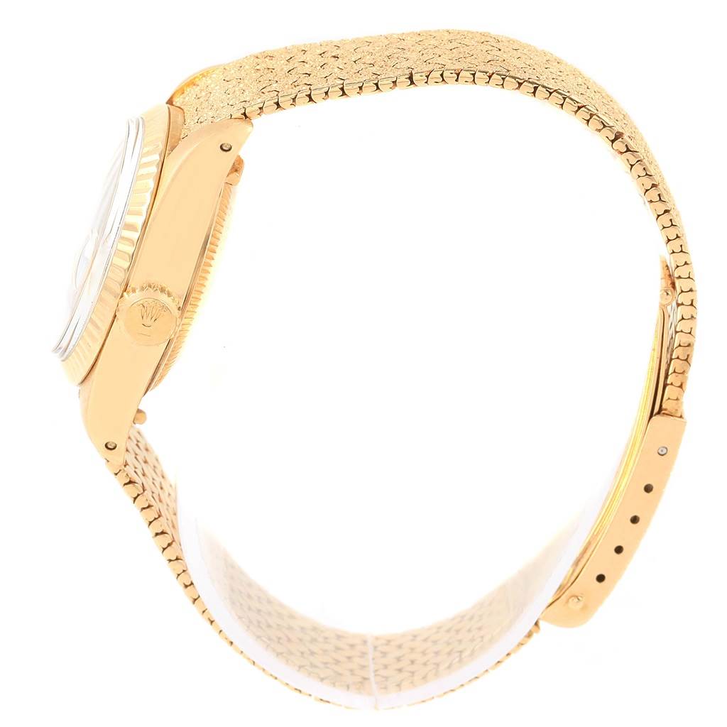 This side-angle image shows the crown, case, bezel, and bracelet of the Rolex President 6917 Women's Yellow Gold Brown Dial 6917 Women's Yellow Gold Brown Dial model watch.