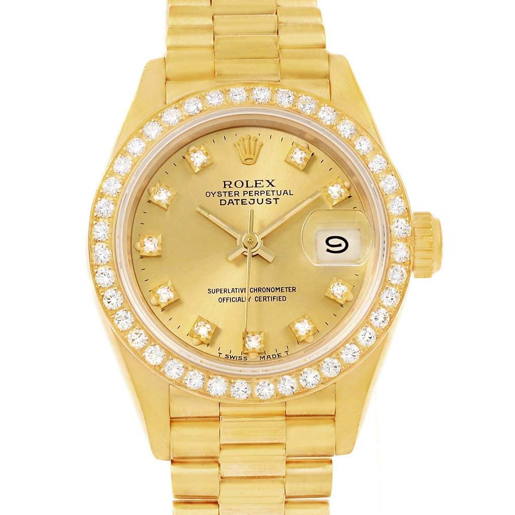This is a frontal view of a Rolex President 69178 Women's Stainless Steel Champagne Dial 69178 Women's Stainless Steel Champagne Dial model, featuring its gold bracelet, diamond bezel, and date display.