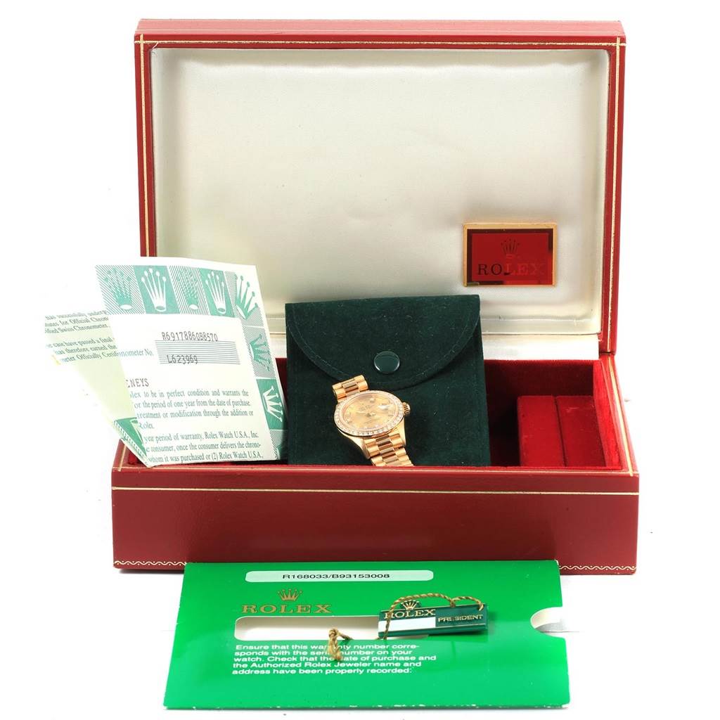 The image shows a Rolex President 69178 Women's Stainless Steel Champagne Dial 69178 Women's Stainless Steel Champagne Dial watch with its box, green pouch, warranty papers, and tags.