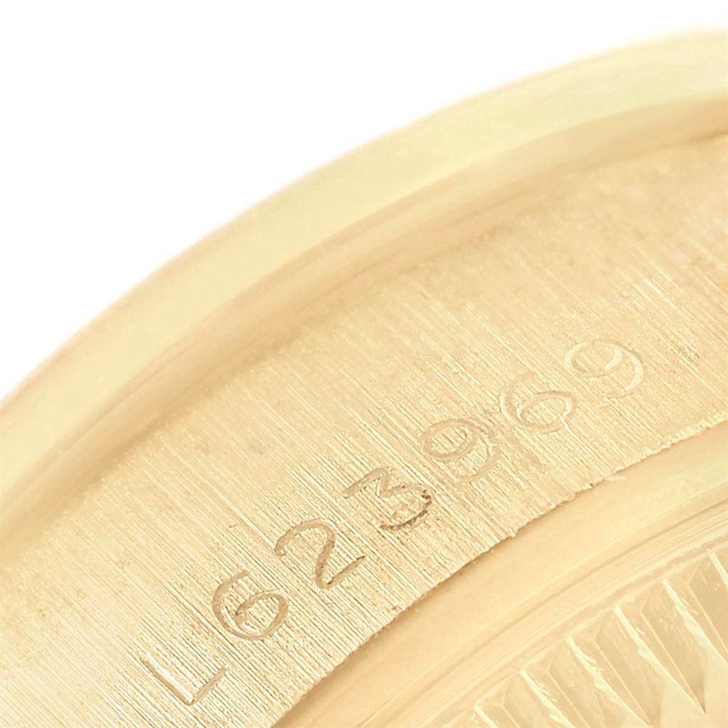 This close-up shows the engraved serial number on the metal band of a Rolex President 69178 Women's Stainless Steel Champagne Dial 69178 Women's Stainless Steel Champagne Dial model watch.