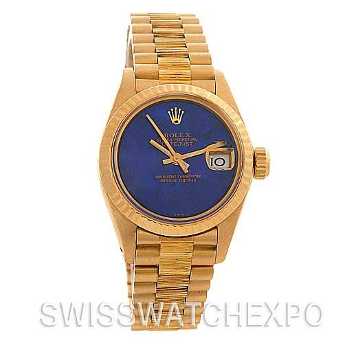 The image shows a front view of a Rolex President 6917 Women's Yellow Gold Blue Dial 6917 Women's Yellow Gold Blue Dial watch, highlighting its gold bracelet, blue dial, and date magnifier.