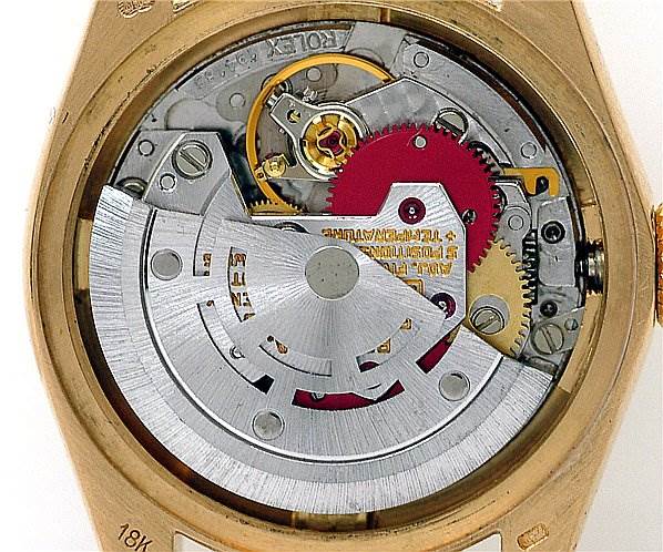The image shows the internal mechanical components of the Rolex President 6917 Women's Yellow Gold Blue Dial 6917 Women's Yellow Gold Blue Dial model watch from a rear, open-caseback view.