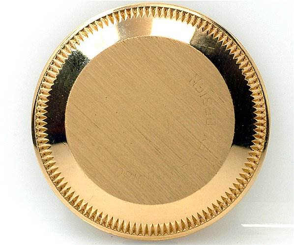 The image shows the back casing of a Rolex President 6917 Women's Yellow Gold Blue Dial 6917 Women's Yellow Gold Blue Dial model watch, viewed from above.