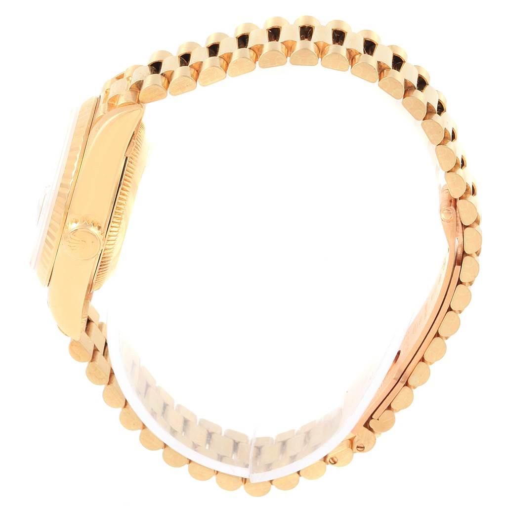 This image shows a side view of the Rolex President 69178 Women
s Yellow Gold Champagne Dial 69178 Women
s Yellow Gold Champagne Dial model, highlighting the crown and bracelet.