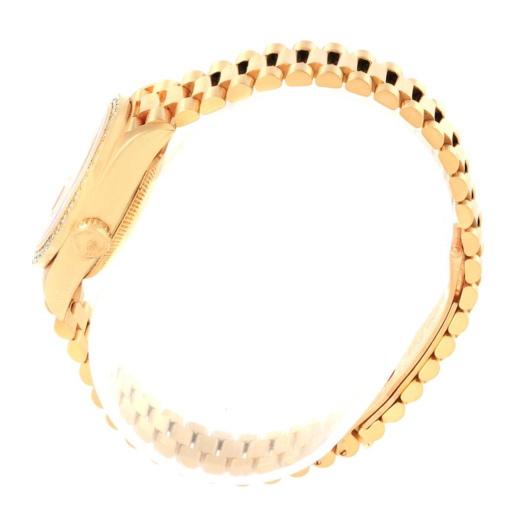 This image shows a side profile of the Rolex President 69178 Women's Yellow Gold Orange Dial 69178 Women's Yellow Gold Orange Dial model watch, emphasizing its bracelet and crown.