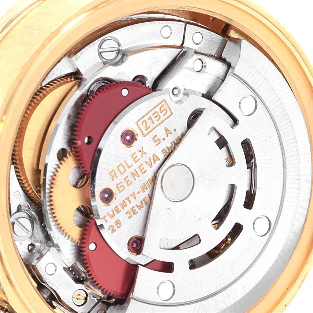 The image shows the intricate movement and inner mechanism of a Rolex President 69038 Women
s Yellow Gold Champagne Dial 69038 Women
s Yellow Gold Champagne Dial model watch from the back.
