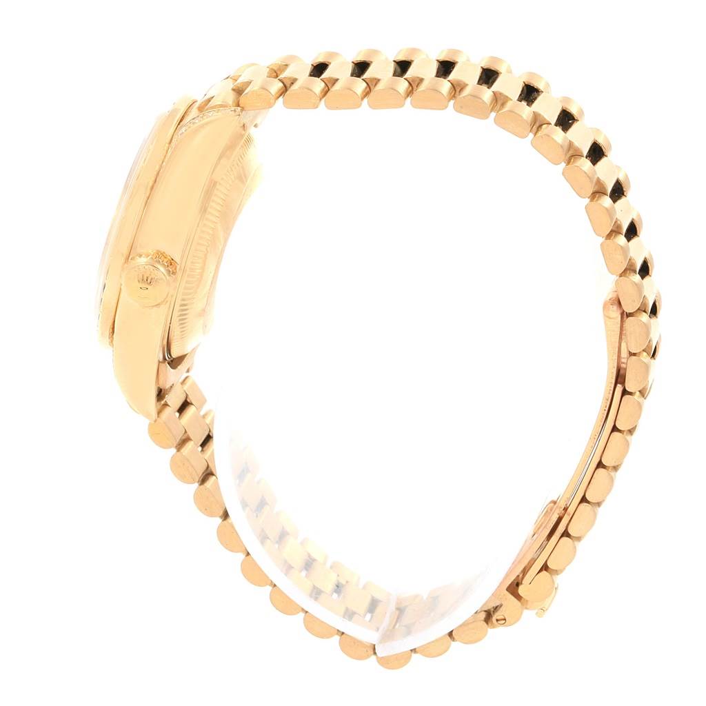 The image shows a side angle of the Rolex President 69038 Women
s Yellow Gold Champagne Dial 69038 Women
s Yellow Gold Champagne Dial model watch displaying its gold case and bracelet.