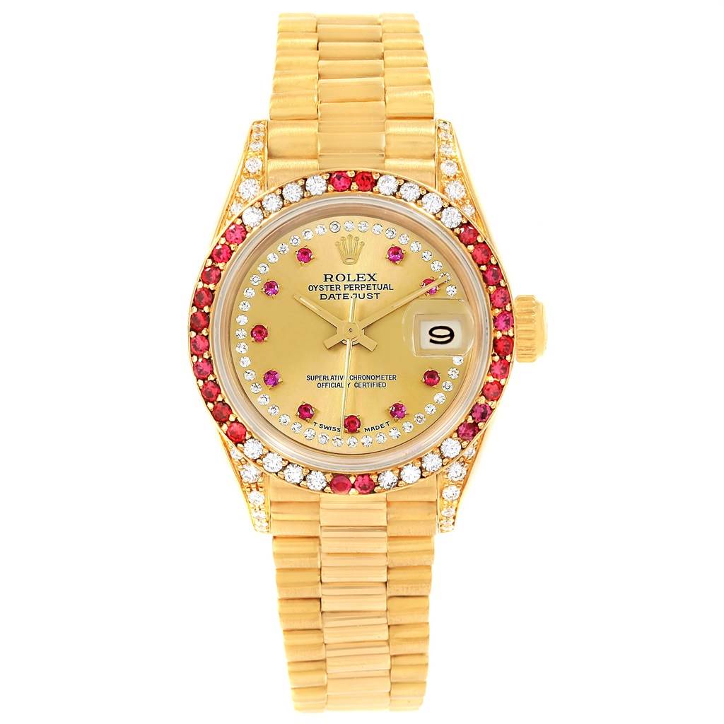 The image shows a front view of the Rolex President 69038 Women
s Yellow Gold Champagne Dial 69038 Women
s Yellow Gold Champagne Dial model watch, featuring a gold band, gem-set bezel, and date display.