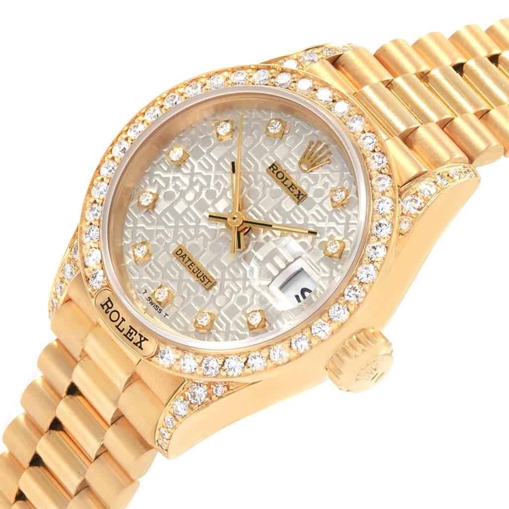 The Rolex President 69158 Women
s Yellow Gold Silver Dial 69158 Women
s Yellow Gold Silver Dial model watch is shown from an angle highlighting its face, bezel, and part of the bracelet.