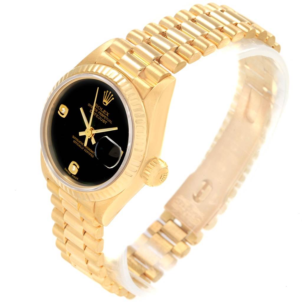 This image shows the front and side view of a Rolex President 69178 Women's Yellow Gold Black Dial 69178 Women's Yellow Gold Black Dial model watch, highlighting its gold case, bracelet, and black dial.
