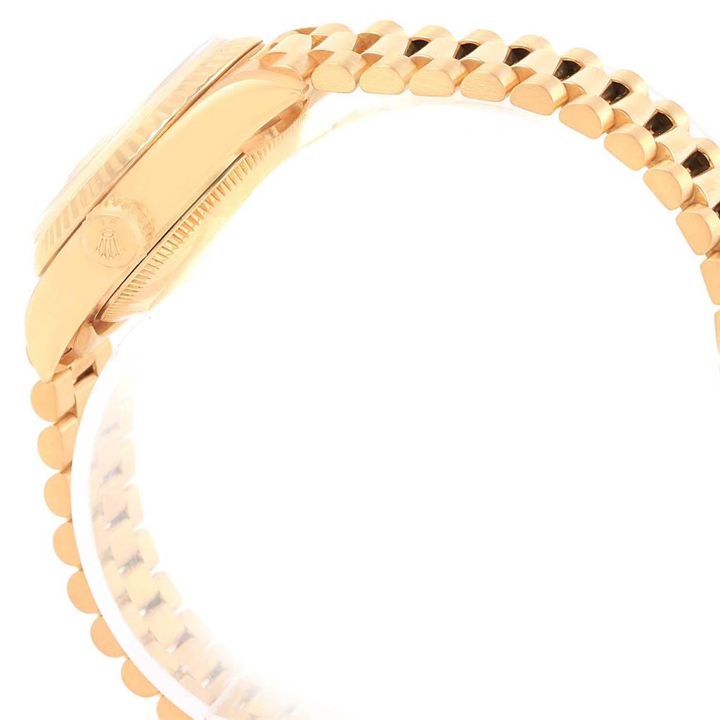 This image shows a side view of the Rolex President 69178 Women's Yellow Gold Black Dial 69178 Women's Yellow Gold Black Dial model, highlighting part of the case and bracelet.