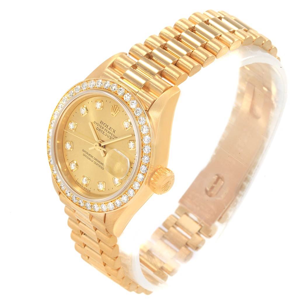 The image shows a Rolex President 79178 Women
s Yellow Gold Champagne Dial 79178 Women
s Yellow Gold Champagne Dial model watch from an angled view, displaying its face, bezel, crown, and bracelet.