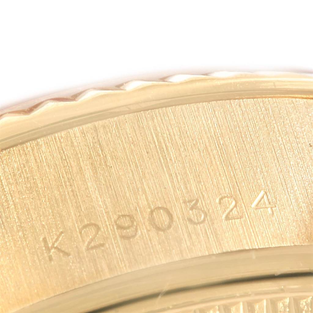 This close-up image of the Rolex President 79178 Women
s Yellow Gold Champagne Dial 79178 Women
s Yellow Gold Champagne Dial model shows part of the watch case with the serial number "K290324."