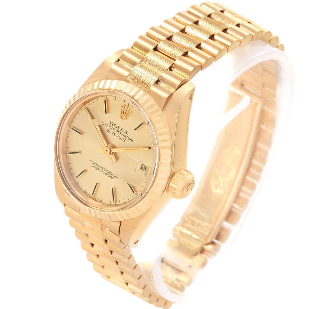The image shows a gold Rolex President 6917 Women's Yellow Gold Champagne Dial 6917 Women's Yellow Gold Champagne Dial model watch at a slight angle, highlighting the dial, bezel, crown, and bracelet.