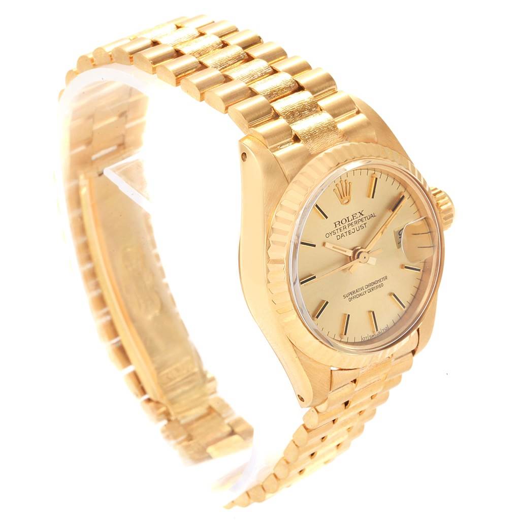 The image shows a side angle of a Rolex President 6917 Women's Yellow Gold Champagne Dial 6917 Women's Yellow Gold Champagne Dial model watch, highlighting its golden bracelet, case, dial, and crown.