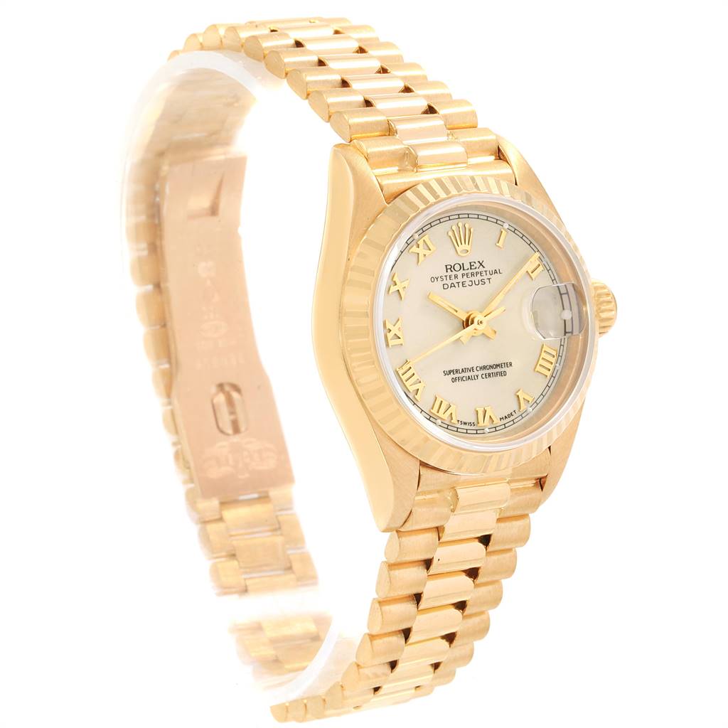 This image of the Rolex President 69178 Women's Yellow Gold Beige Dial 69178 Women's Yellow Gold Beige Dial model watch shows the dial, case, and bracelet at a slight angle.