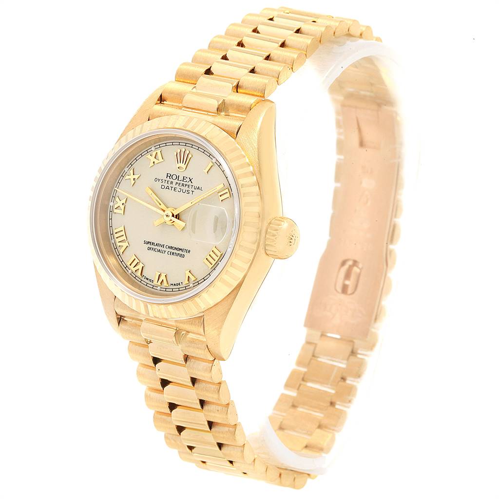 This Rolex President 69178 Women's Yellow Gold Beige Dial 69178 Women's Yellow Gold Beige Dial model watch is shown at a slight angle, displaying its gold case, fluted bezel, dial, and President bracelet.