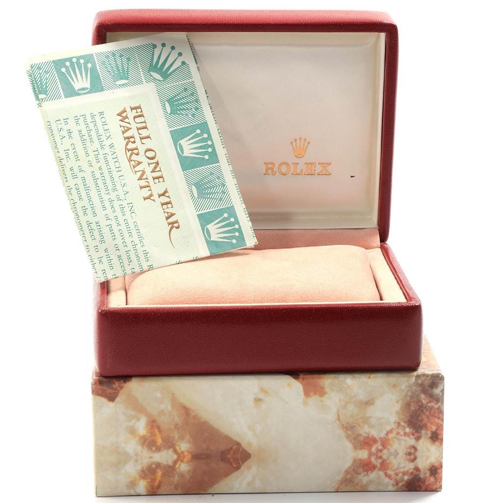 The image shows the box and warranty card for the Rolex President 69178 Women
s Yellow Gold Champagne Dial 69178 Women
s Yellow Gold Champagne Dial model watch.