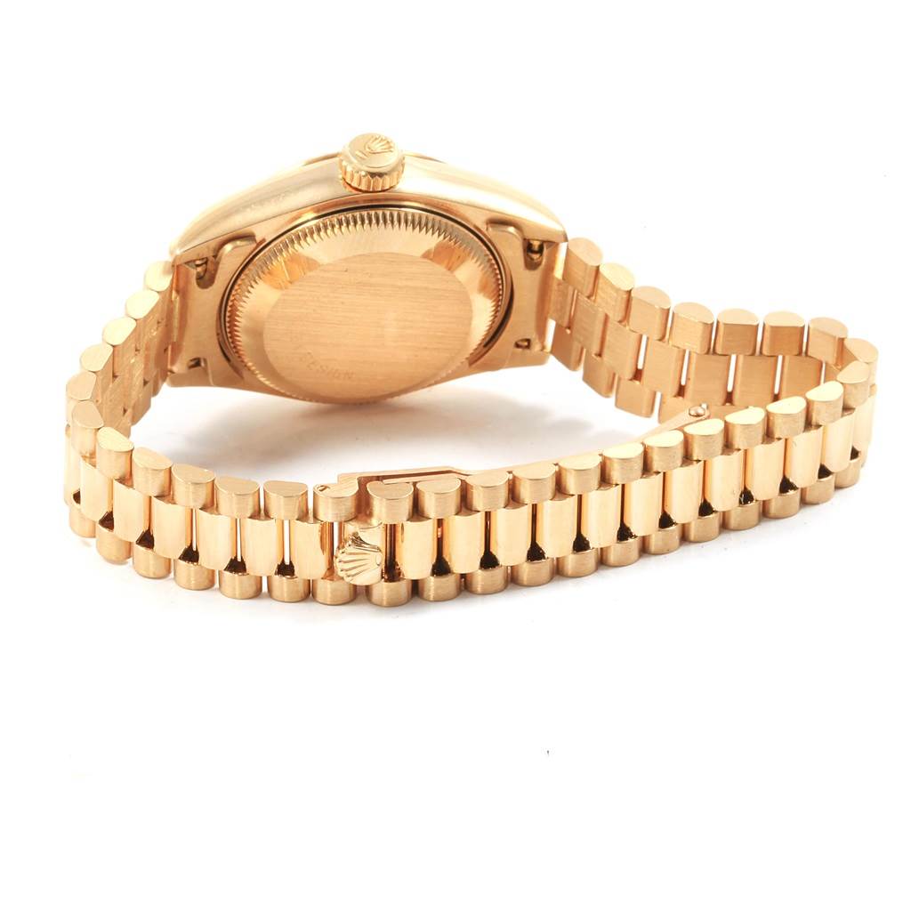The image shows the back and bracelet of a Rolex President 69178 Women
s Yellow Gold Champagne Dial 69178 Women
s Yellow Gold Champagne Dial model watch from a rear angle.
