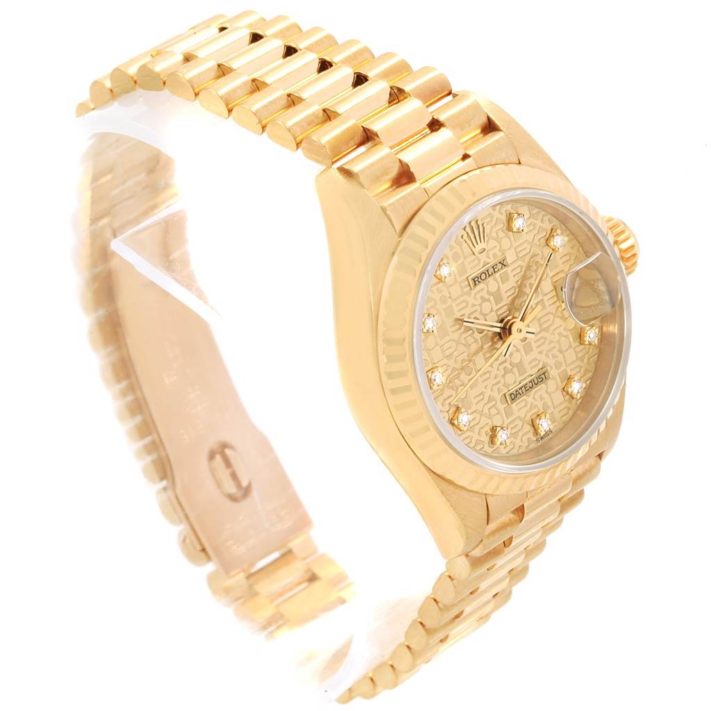 The image shows a Rolex President 69178 Women
s Yellow Gold Champagne Dial 69178 Women
s Yellow Gold Champagne Dial model watch at an angle highlighting the gold bracelet, bezel, and diamond-studded dial.