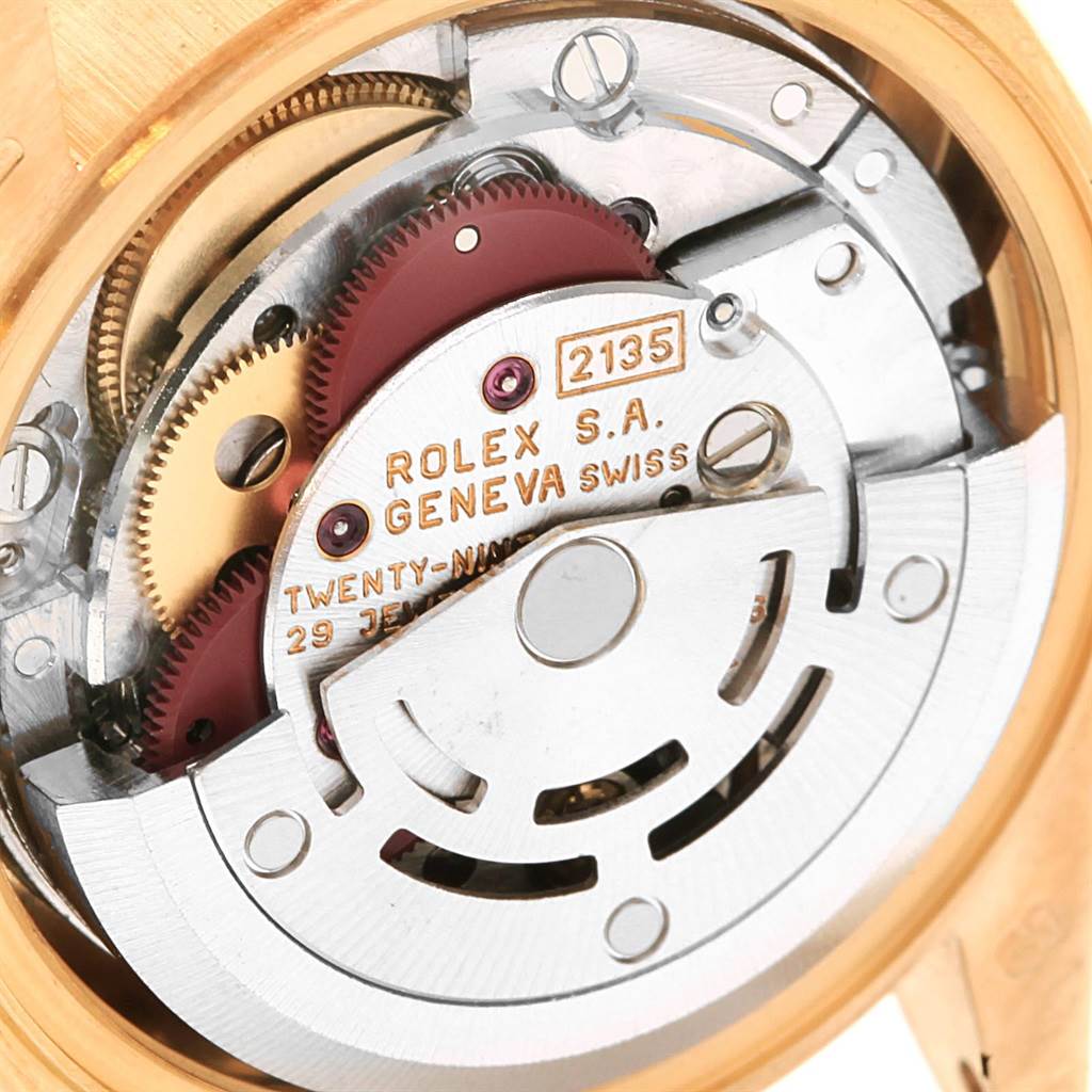 The image shows the movement mechanism of a Rolex President 69178 Women's Yellow Gold Black Dial 69178 Women's Yellow Gold Black Dial model watch viewed from the back.