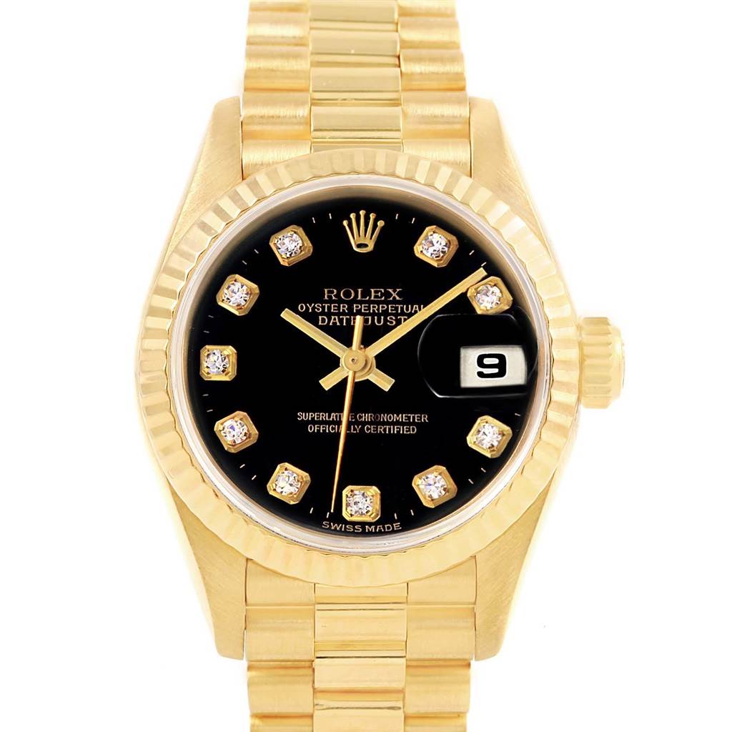 The Rolex President 69178 Women's Yellow Gold Black Dial 69178 Women's Yellow Gold Black Dial watch model is shown front-facing, displaying the gold bracelet, black dial, diamond hour markers, and date window.