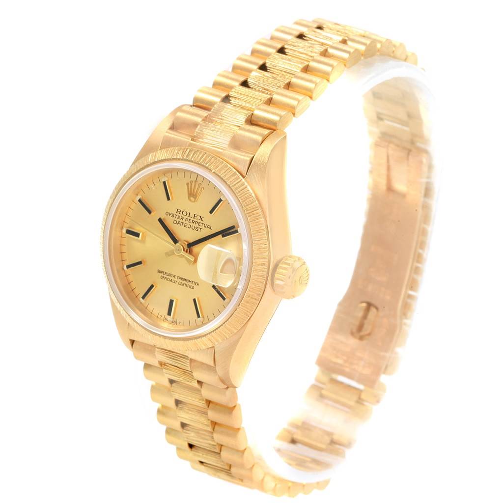 The Rolex President 69278 Women
s Yellow Gold Champagne Dial 69278 Women
s Yellow Gold Champagne Dial model watch is shown at an oblique angle, displaying the face, bezel, crown, and bracelet.