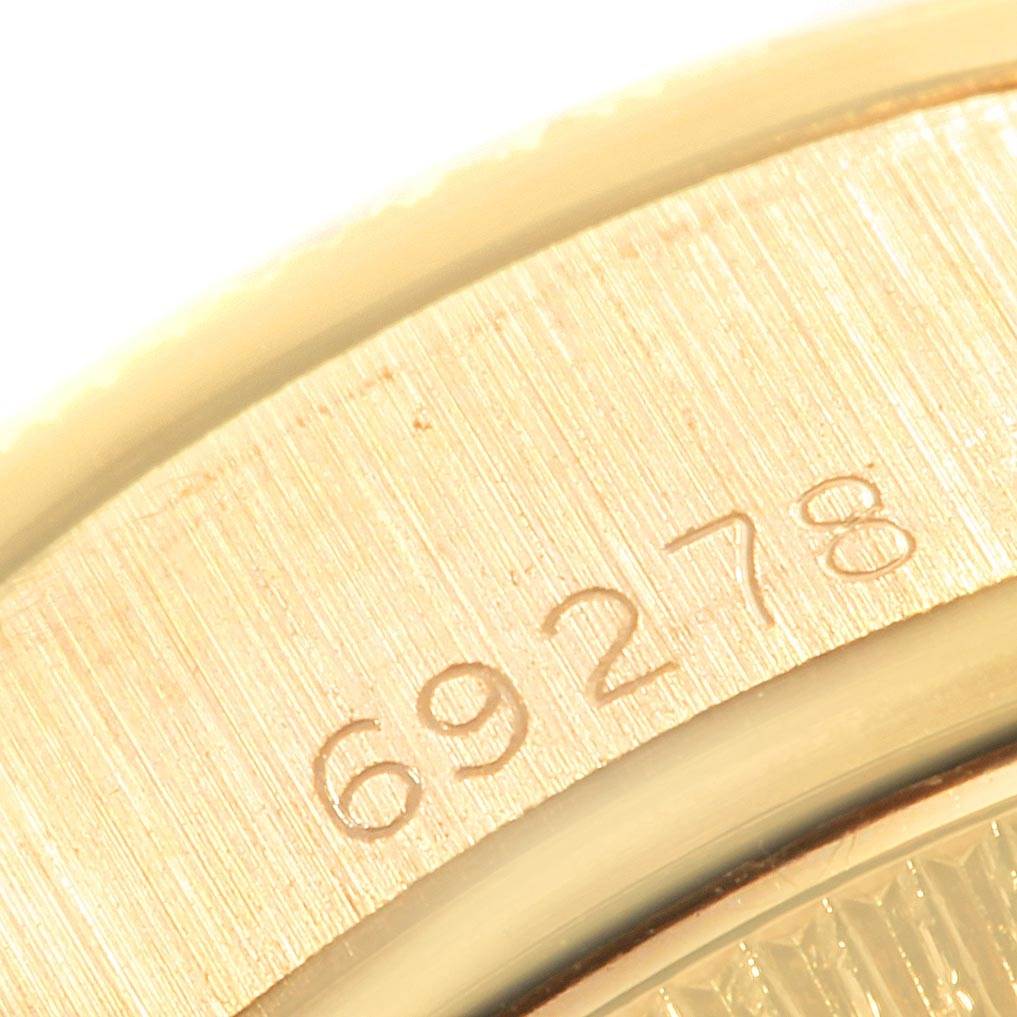 This is a close-up view of the serial number engraved on the Rolex President 69278 Women
s Yellow Gold Champagne Dial 69278 Women
s Yellow Gold Champagne Dial watch case.