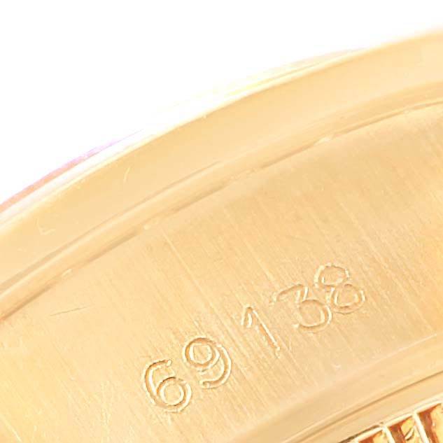 The image shows the engraved model number "69138" on the inner case of a Rolex President 69138 Women's Yellow Gold Blue Dial 69138 Women's Yellow Gold Blue Dial watch.