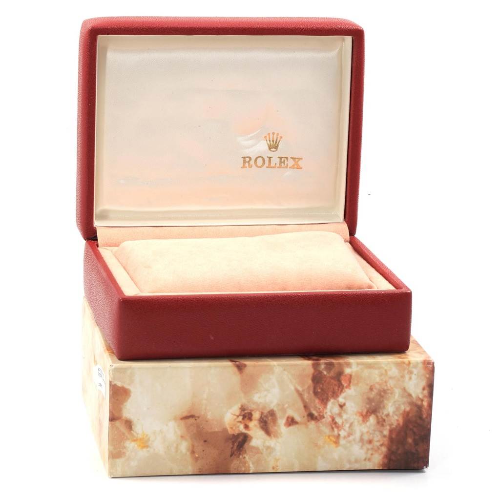 The image shows an open box for a Rolex President 69038 Women's Yellow Gold Champagne Dial 69038 Women's Yellow Gold Champagne Dial model watch, featuring the brand logo inside the lid.