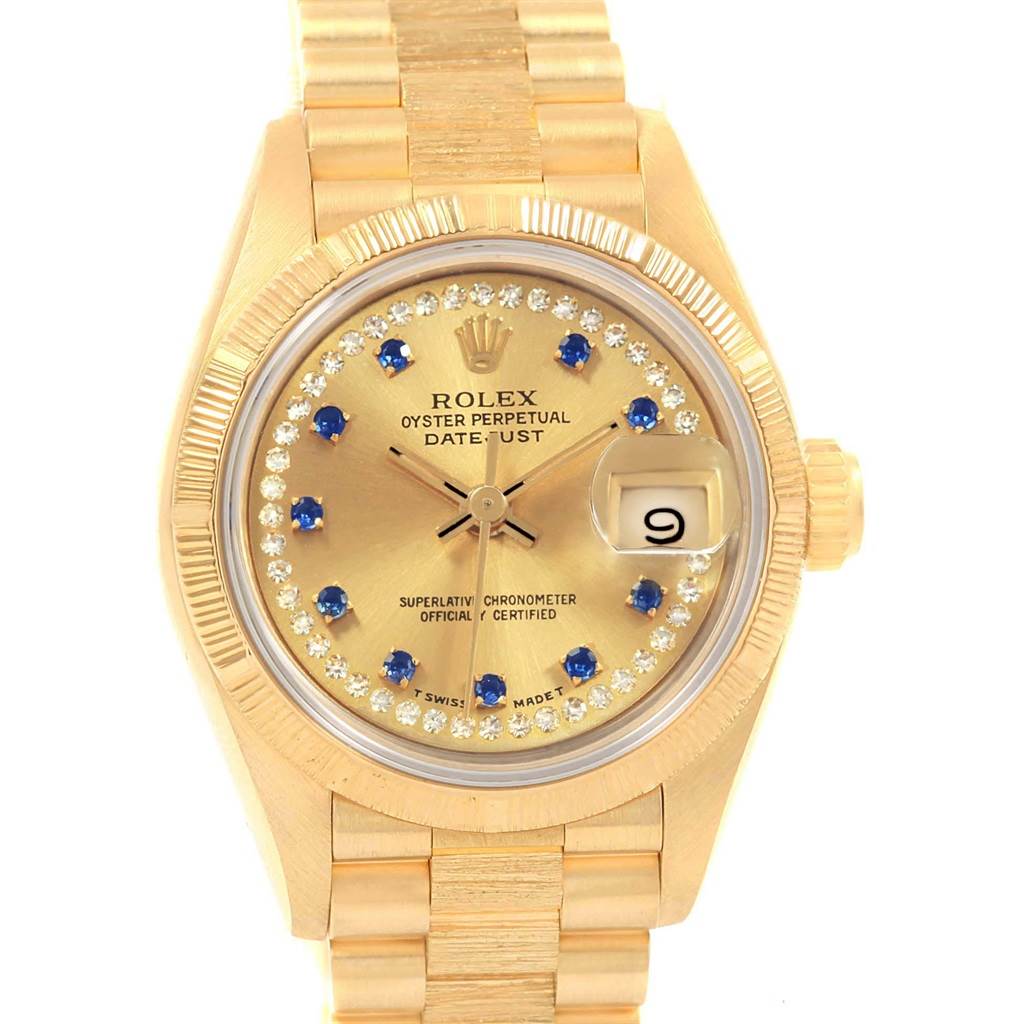 The image shows a frontal view of the Rolex President 69038 Women's Yellow Gold Champagne Dial 69038 Women's Yellow Gold Champagne Dial model watch, highlighting the dial, bezel, crown, and bracelet.