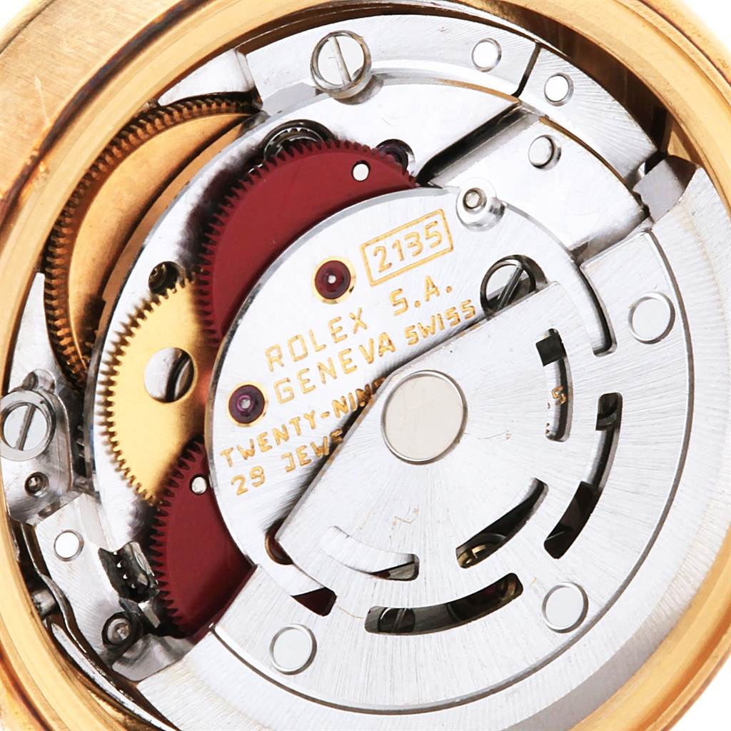 This image shows a close-up view of the inner movement mechanism of the Rolex President 69038 Women's Yellow Gold Champagne Dial 69038 Women's Yellow Gold Champagne Dial model watch.