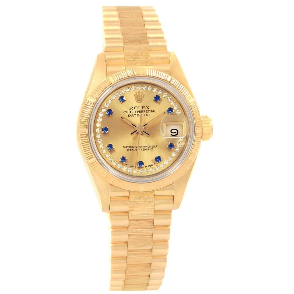 The Rolex President 69038 Women's Yellow Gold Champagne Dial 69038 Women's Yellow Gold Champagne Dial model watch is shown from a front angle, showcasing its dial, bezel, and bracelet.