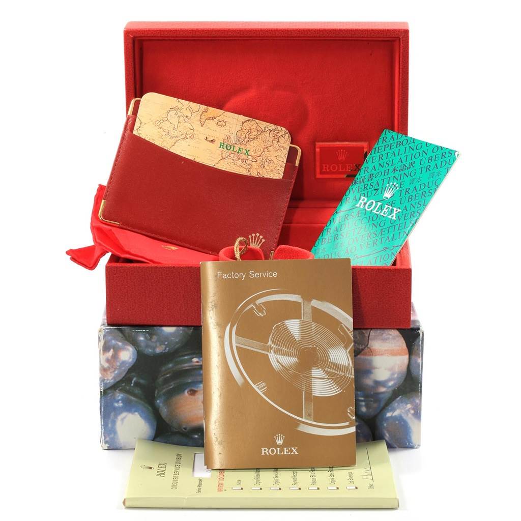 This image shows the accessories and packaging for a Rolex President 69278 Women
s Yellow Gold Champagne Dial 69278 Women
s Yellow Gold Champagne Dial model, including manuals and cards from a front angle.