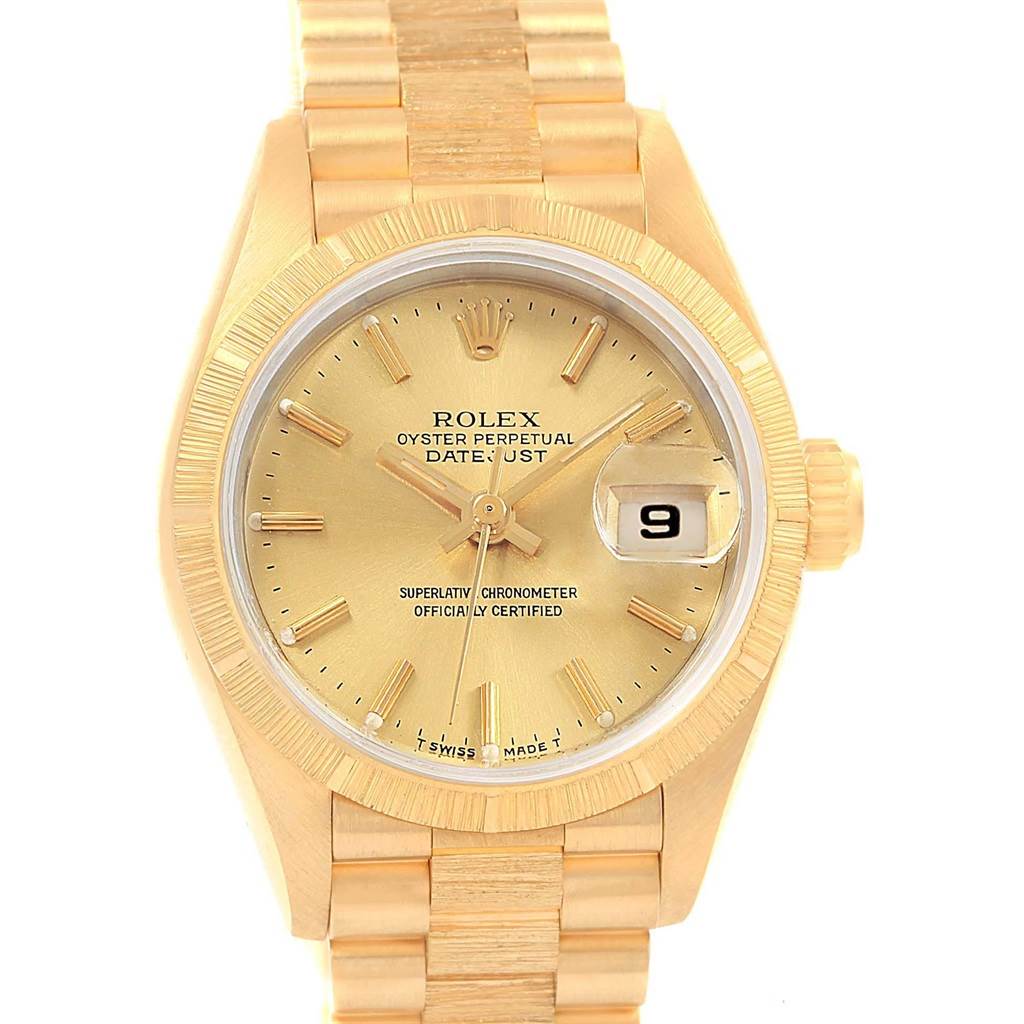 The image shows a front view of the Rolex President 69278 Women
s Yellow Gold Champagne Dial 69278 Women
s Yellow Gold Champagne Dial model watch, displaying its dial, hands, date window, and bracelet.