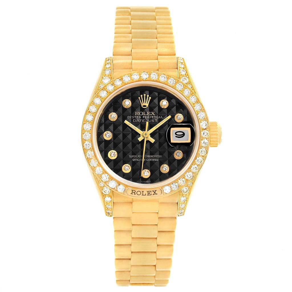 This image shows a front view of a Rolex President 69158 Women's Yellow Gold Black Dial 69158 Women's Yellow Gold Black Dial model watch with a diamond-studded bezel and black dial.