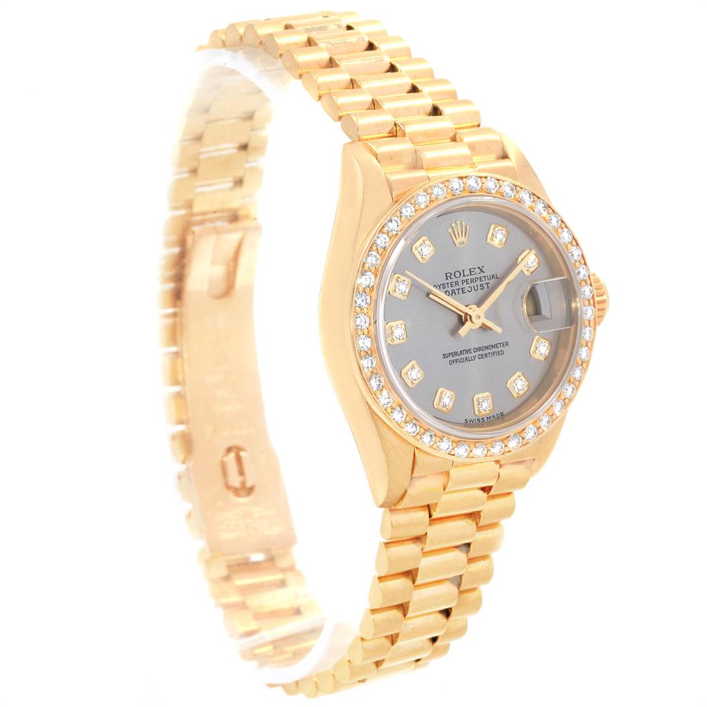 The Rolex President 69178 Women's Yellow Gold Silver Dial 69178 Women's Yellow Gold Silver Dial model watch is shown at a slight angle, displaying its gold bracelet, diamond bezel, and grey dial.