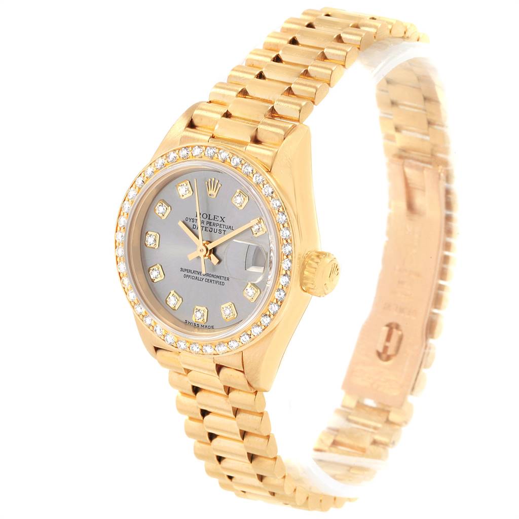 This image shows a side angle of a Rolex President 69178 Women's Yellow Gold Silver Dial 69178 Women's Yellow Gold Silver Dial watch, featuring its face, bezel, crown, and gold bracelet.