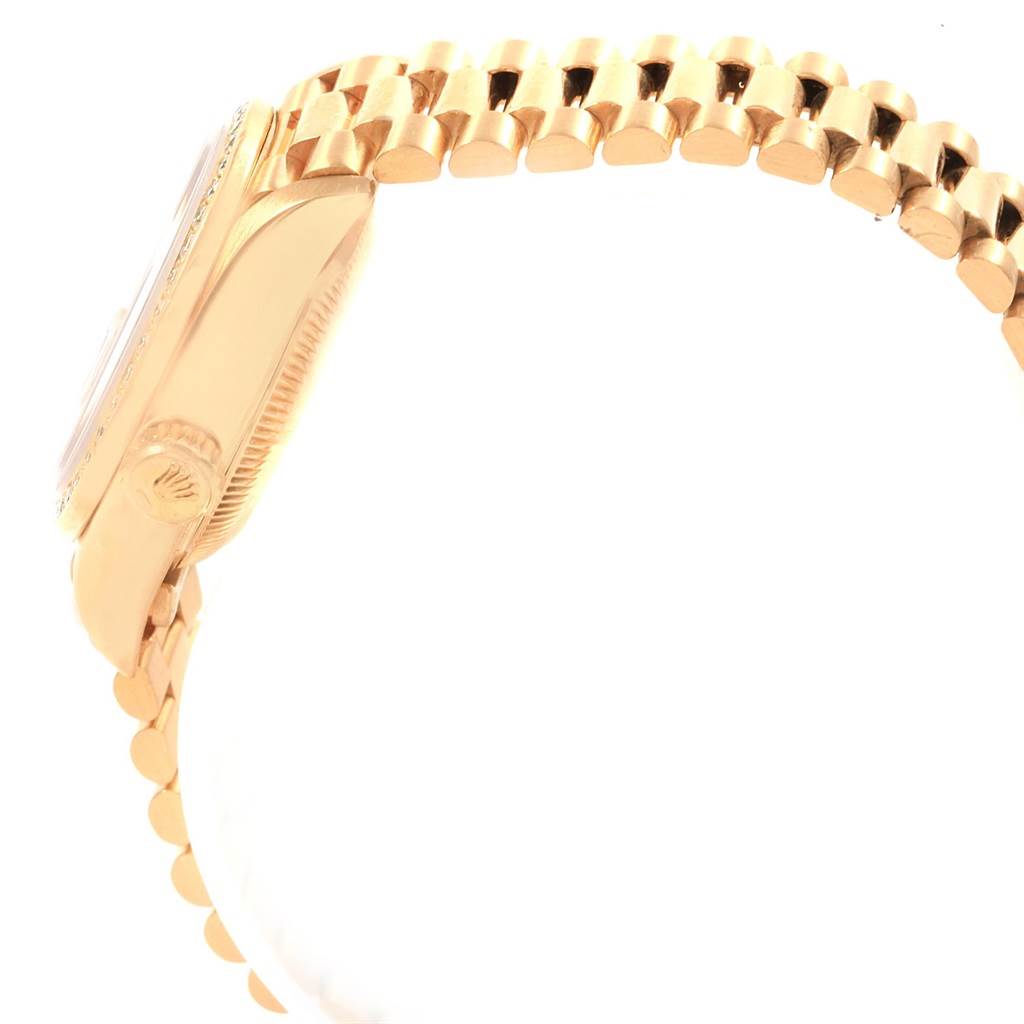 This image shows a side view of a Rolex President 69178 Women's Yellow Gold Blue Dial 69178 Women's Yellow Gold Blue Dial model watch, highlighting the case and part of the bracelet.
