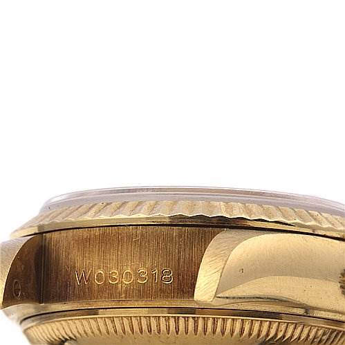 This image shows a side view of the case and serial number of a Rolex President 69068 Women's Yellow Gold Black Dial 69068 Women's Yellow Gold Black Dial model watch.